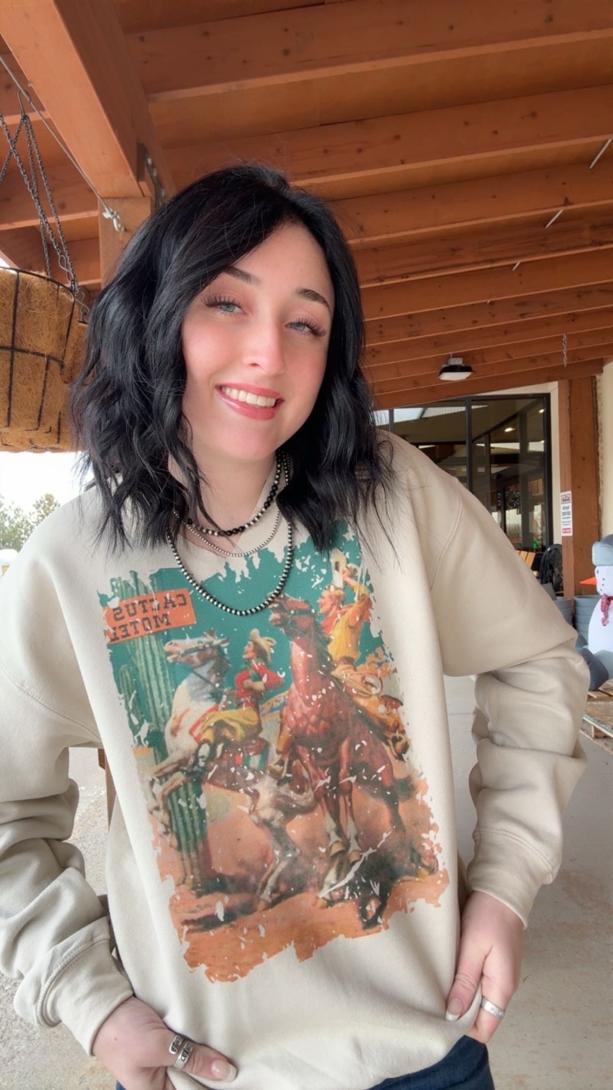 Cactus Motel Cowboy Sweatshirt